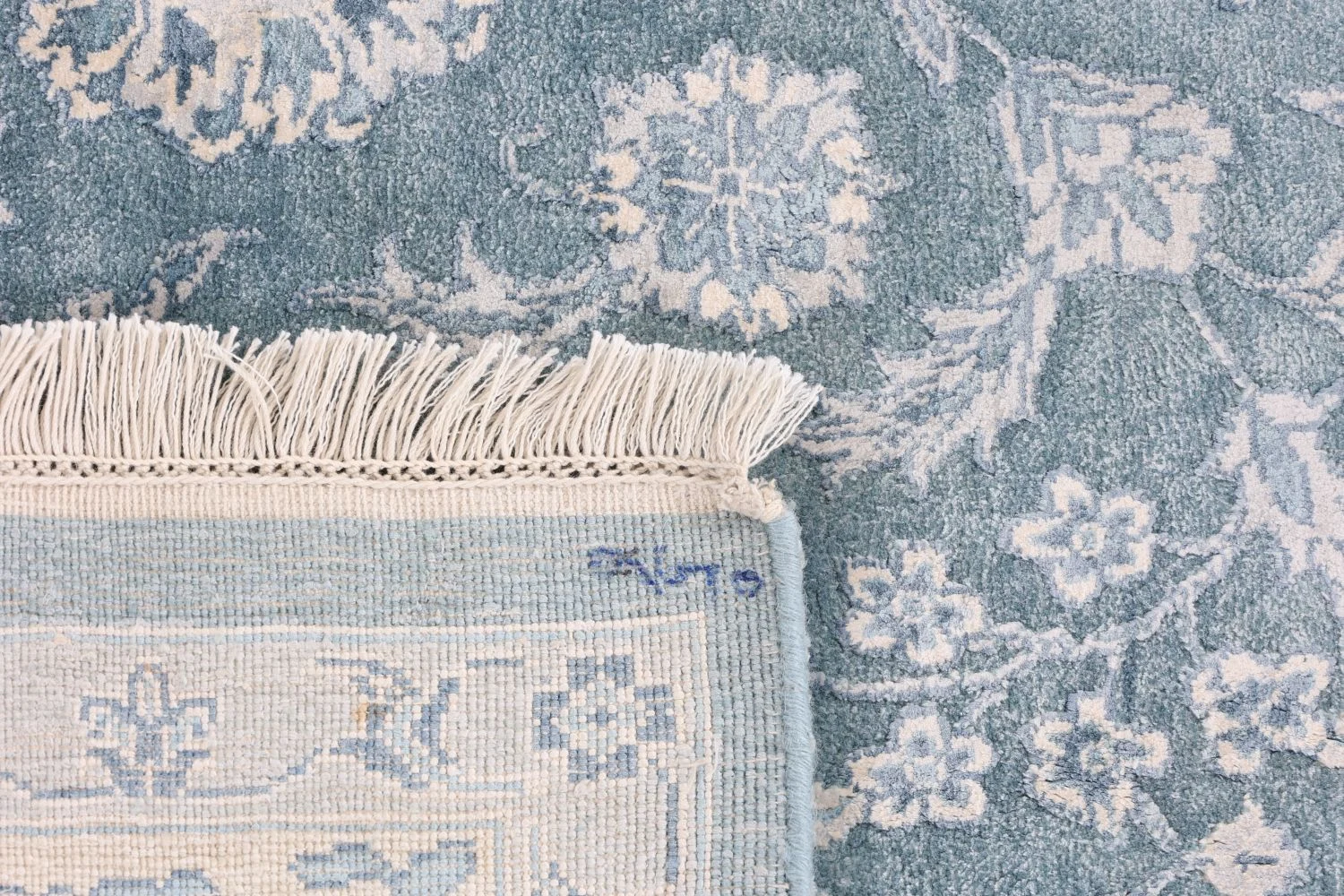 Indian Rug — hand-knotted, 165 × 245 cm, Wool